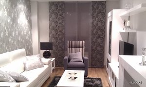 Salón comedor con sofá de piel