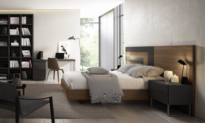 Dormitorio estilo moderno con zona de escritorio